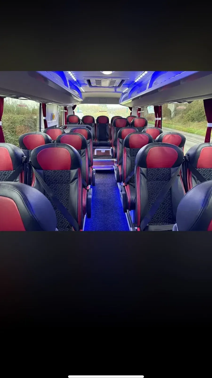 Interior seating view down the aisle of a supplied WMC coach